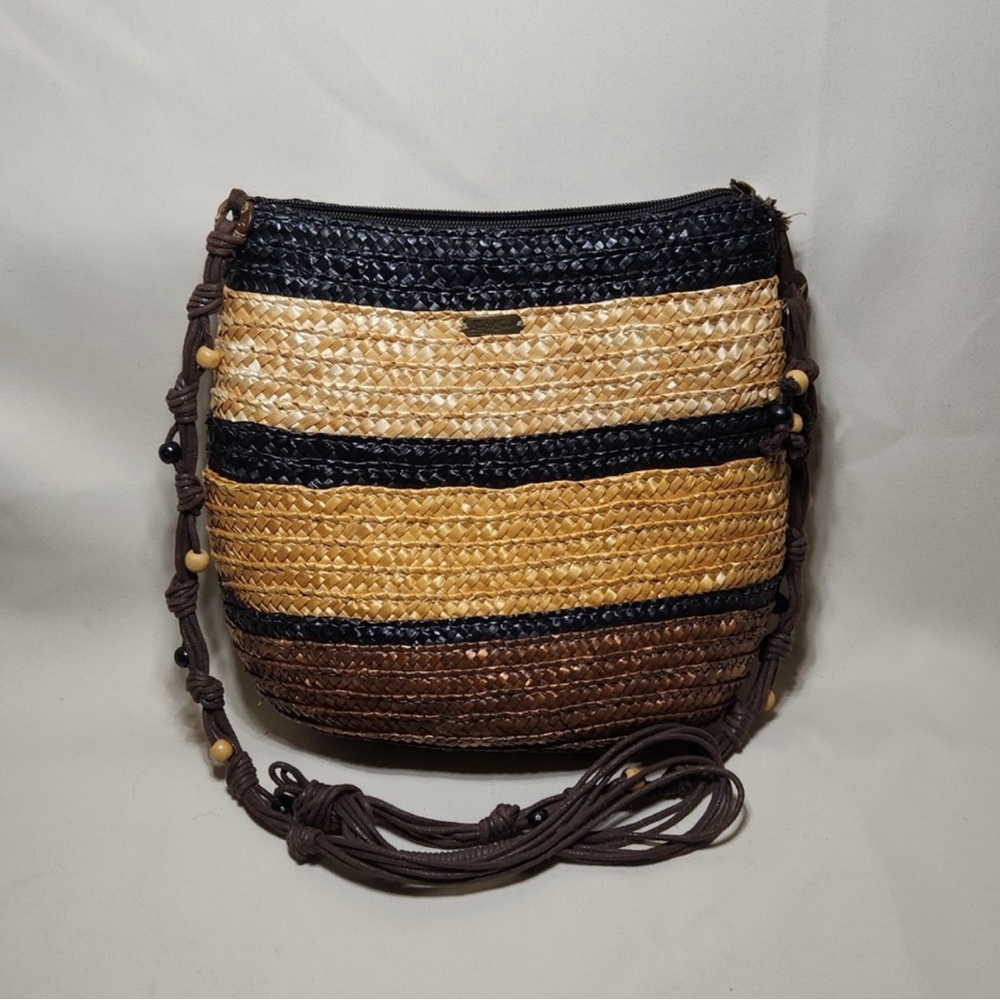Sun & Sand, Handcrafted multicolored crossbody bag that give it a unique look.